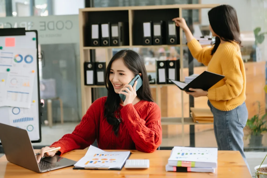 two-asian-businesswoman-discuss-investment-project-2